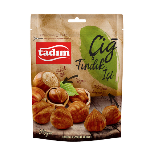 Tadim brand packaging of roasted hazelnuts on a white background